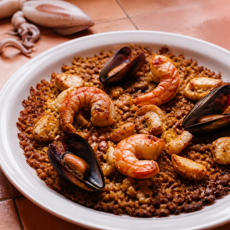 Seafood Paella with Shrimp-Shell Stock and Real Socarrat